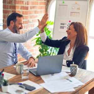 woman-and-a-man-high-five-celebrating